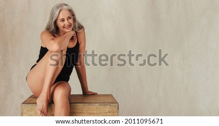 Similar – Image, Stock Photo Mature woman with natural gray hair