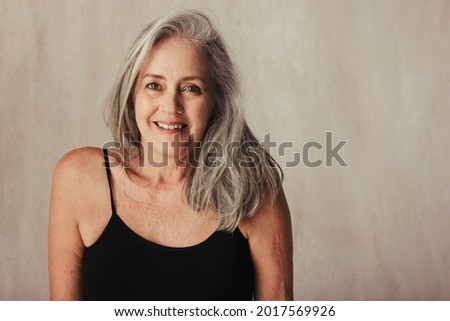 Similar – Image, Stock Photo Mature woman with natural gray hair