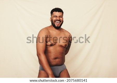 Image, Stock Photo Young man shirtless on the beach, clear background, liberty confidence concepts, holiday, beard and long hair