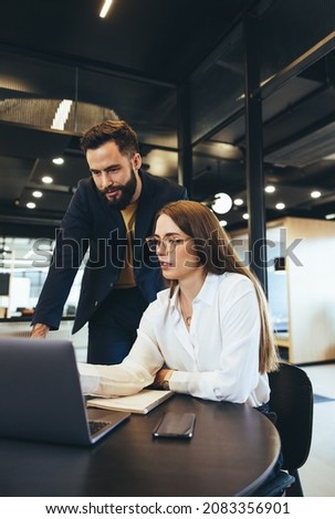 Similar – Foto Bild Fokussierte Frau, die zu Hause mit Gadgets arbeitet