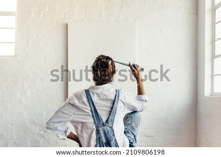 Similar – Image, Stock Photo Rearview of a woman on the river