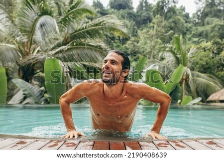 Similar – Foto Bild Mann schwimmt im Pool, blaues Wasser