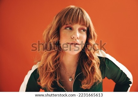 Similar – Image, Stock Photo Thoughtful young woman standing near modern building