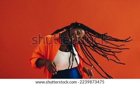 Similar – Image, Stock Photo Excited black woman having fun in park