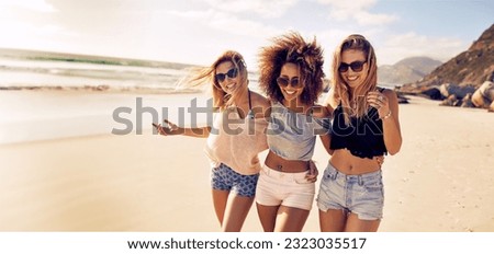 Similar – Foto Bild Drei junge Frauen gehen am Cathedrals Beach in Galizien spazieren.