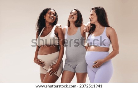 Similar – Image, Stock Photo Pregnant woman on yoga ball working out with elastic band