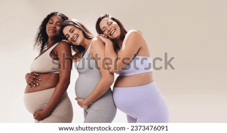 Similar – Image, Stock Photo Pregnant woman on yoga ball working out with elastic band