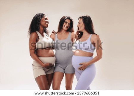 Similar – Image, Stock Photo Pregnant woman on yoga ball working out with elastic band