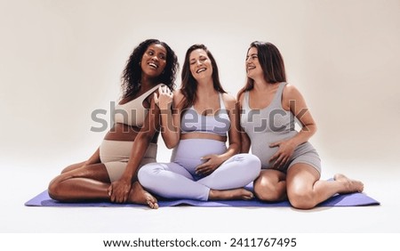 Similar – Image, Stock Photo Pregnant woman exercising with personal trainer