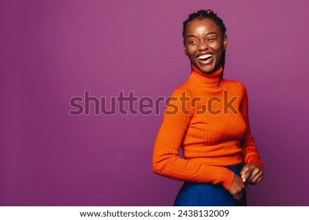 Similar – Image, Stock Photo Woman with braids in studio looking at camera