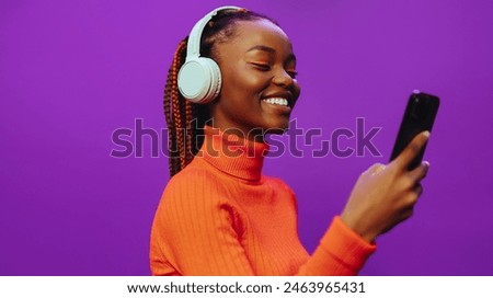 Similar – Image, Stock Photo Young woman listening to music from vinyl record player. Playing music on turntable player. Female enjoying music from old record collection at home