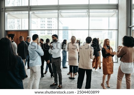 Similar – Image, Stock Photo Persons in the event of rising water on the tidal flats