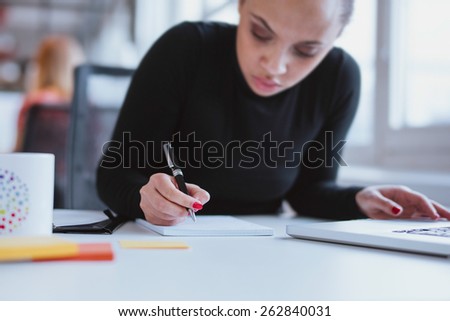 Similar – Image, Stock Photo Ethnic woman taking notes in notebook at home