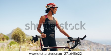 Image, Stock Photo Positive female cyclist resting on street