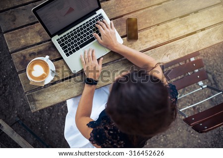 Similar – Image, Stock Photo Woman using her laptop at home.