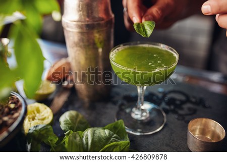 Similar – Image, Stock Photo Crop barman preparing cocktail at counter