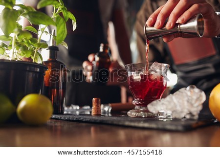 Similar – Image, Stock Photo Crop barman preparing cocktail at counter