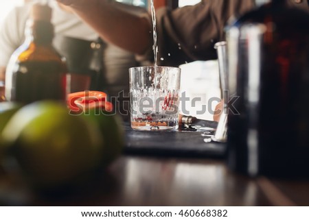 Similar – Image, Stock Photo Crop barman preparing cocktail at counter