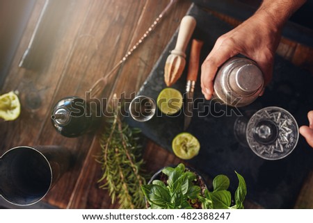 Similar – Image, Stock Photo Crop barman preparing cocktail at counter