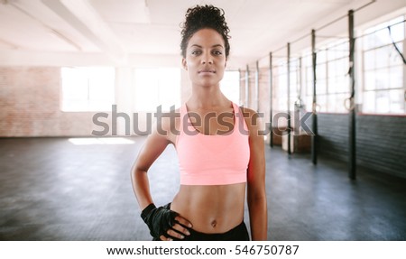 Similar – Image, Stock Photo Afro athlete woman standing outdoors.