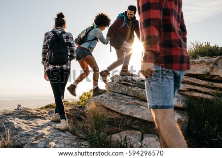 Image, Stock Photo Four people hiking with fog