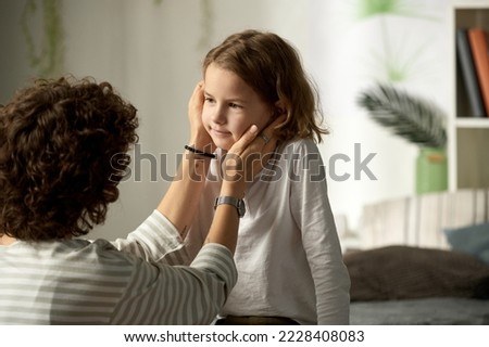 Similar – Image, Stock Photo Mother with little son washing baby in bathtub