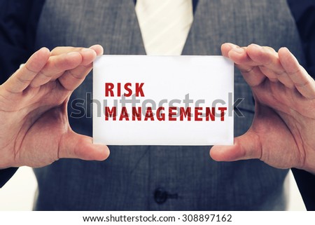 Executive Holding card with Message Saying-Risk Management