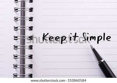 Close up Word keep it simple on notebook