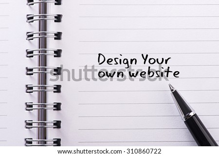 Close up word written design your own website on notebook