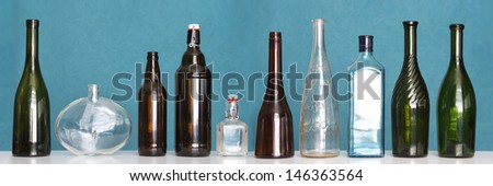 Lined up various glass bottles