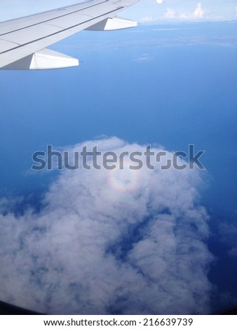 Circle Rainbow on the cloud taking from plane : Cloud shape look like Heart : Rare Picture