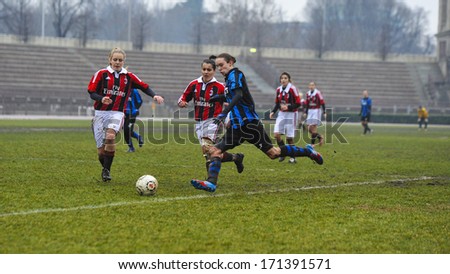 MILAN, ITALY - JANUARY 20: Amateur Female Soccer League match, in Milan, January 20, 2013. AC Milan vs Inter Milan.