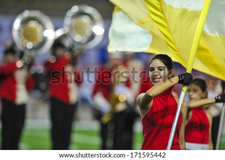 MILAN, ITALY - AUGUST 31: Majorettes and marching band performing before an American Football match between Italy and Spain in Milan August 31, 2013.