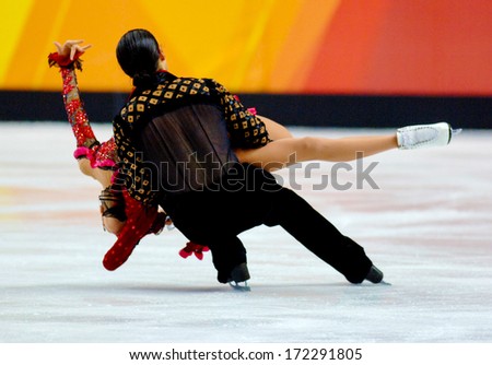 TURIN, ITALY - MARCH 28: Couple dancing during Figure Ice Skating competition of the  Winter Olympic Games in Turin, March, 28 2006.