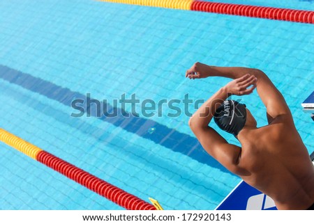 ROME ITALY - AUGUST 25: Swimmer man stretching before a race of the International Swimming Championship 