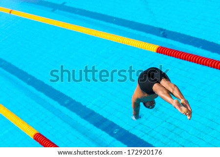 ROME ITALY - AUGUST 25: Swimmer diving into water during a swimming race of the International Swimming Championship \