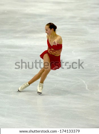 TURIN, ITALY - FEBRUARY 26, 2006: Kimmie Meissner (USA) performs during the Winter Olympics female\'s final of the Figure Ice Skating.