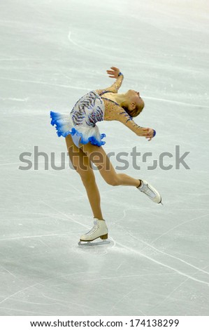 TURIN, ITALY - FEBRUARY 22, 2006: Carolina Kostner (Italy) performs during the Winter Olympics female\'s competition of the Figure Ice Skating.
