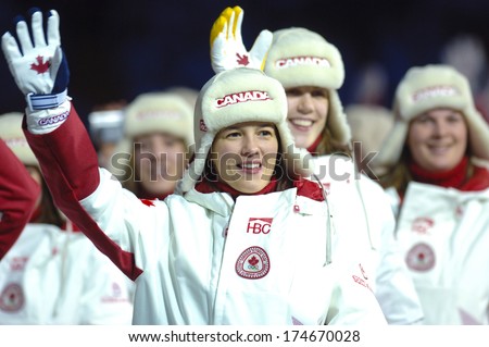 TURIN, ITALY-FEBRUARY 11, 2006: Canadian athletes enter the stadium during the Opening ceremony of the Winter Olympic Games of Turin 2006.