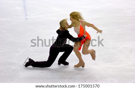 TURIN, ITALY-FEBRUARY 20, 2006: Albena Denkova and Maxim Staviski competing during the Couple Figure Ice Skating during the Winter Olympic Games of Turin 2006.