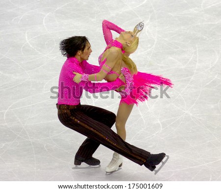 TURIN, ITALY-FEBRUARY 20, 2006: Elena Grushina and Ruslan Goncharov competing during the Couple Figure Ice Skating during the Winter Olympic Games of Turin 2006.