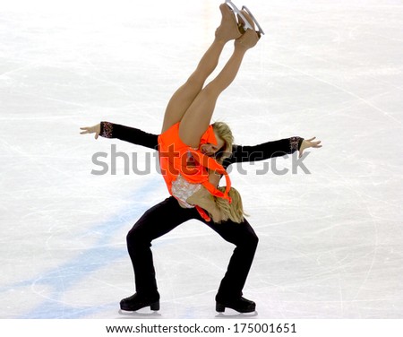 TURIN, ITALY-FEBRUARY 20, 2006: Albena Denkova and Maxim Staviski competing during the Couple Figure Ice Skating during the Winter Olympic Games of Turin 2006.