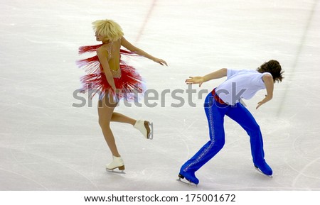 TURIN, ITALY-FEBRUARY 20, 2006: Oksana Domnina and Maxim Shabalin competing during the Couple Figure Ice Skating during the Winter Olympic Games of Turin 2006.