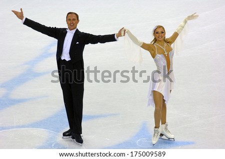 TURIN, ITALY-FEBRUARY 18, 2006: Tatiana Navka and Roman Kostomarov at the end of their competition during the Couple Ice Figure Skating during the Winter Olympic Games of Turin 2006.