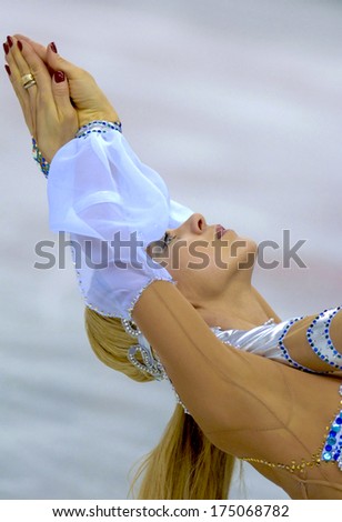 TURIN, ITALY-FEBRUARY 21, 2006: Elena Grushina competing  on the Couple Figure Ice Skating\'s final during the Winter Olympic Games of Turin 2006.