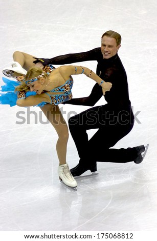 TURIN, ITALY-FEBRUARY 20, 2006: Tatiana Navka and Roman Kostomarov competing  on the Couple Figure Ice Skating\'s final during the Winter Olympic Games of Turin 2006.