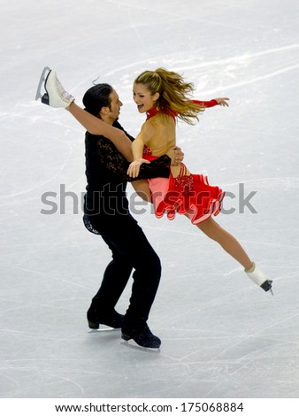 TURIN, ITALY-FEBRUARY 20, 2006: Tanith Belbin and Benjamin Agosto competing  on the Couple Figure Ice Skating competition during the Winter Olympic Games of Turin 2006.