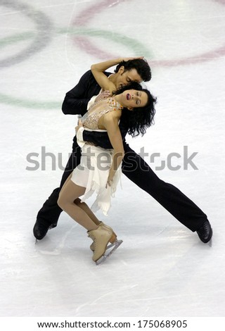 TURIN, ITALY-FEBRUARY 20, 2006: Marie France Dubrevil and Patrice Lauzon competing  on the Couple Figure Ice Skating competition during the Winter Olympic Games of Turin 2006.