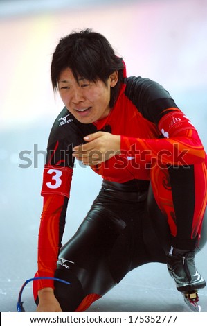 TURIN, ITALY-FEBRUARY 17, 2006: Japanese athlete cries for the effort at the end of the Speed Ice Skating competition during the Winter Olympic Games of Turin 2006.
