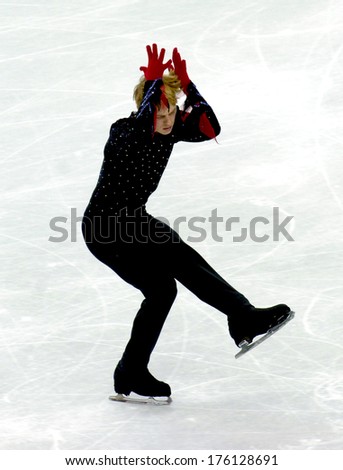TURIN, ITALY-FEBRUARY 15, 2006: Anton Kovalevski competes during the Individual Male Figure Ice Skating competition at the Winter Olympic Games of Turin 2006.